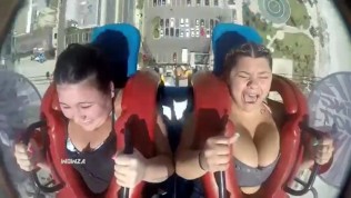 Huge tits on a sling shot ride! 